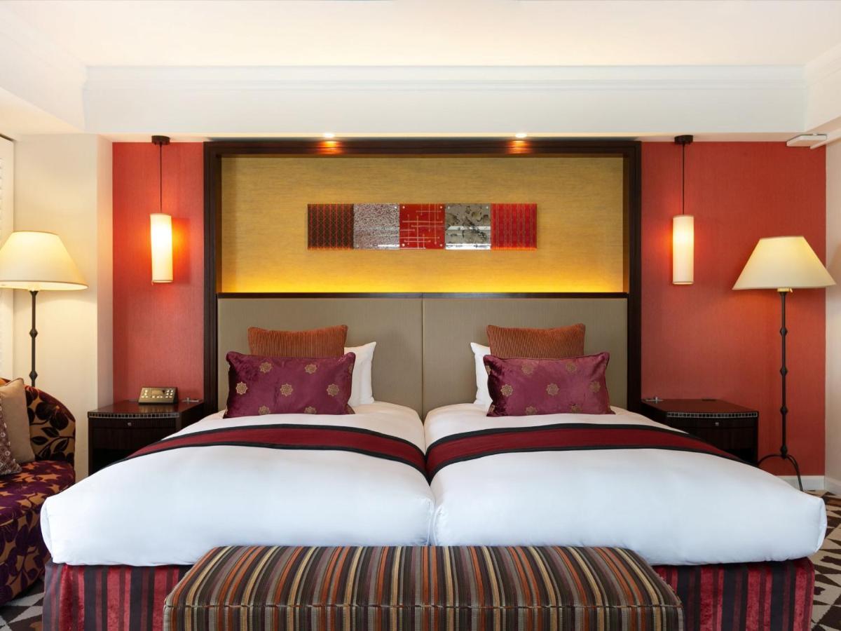 Hotel Nikko Alivila Yomitan Luaran gambar A bedroom at the hotel